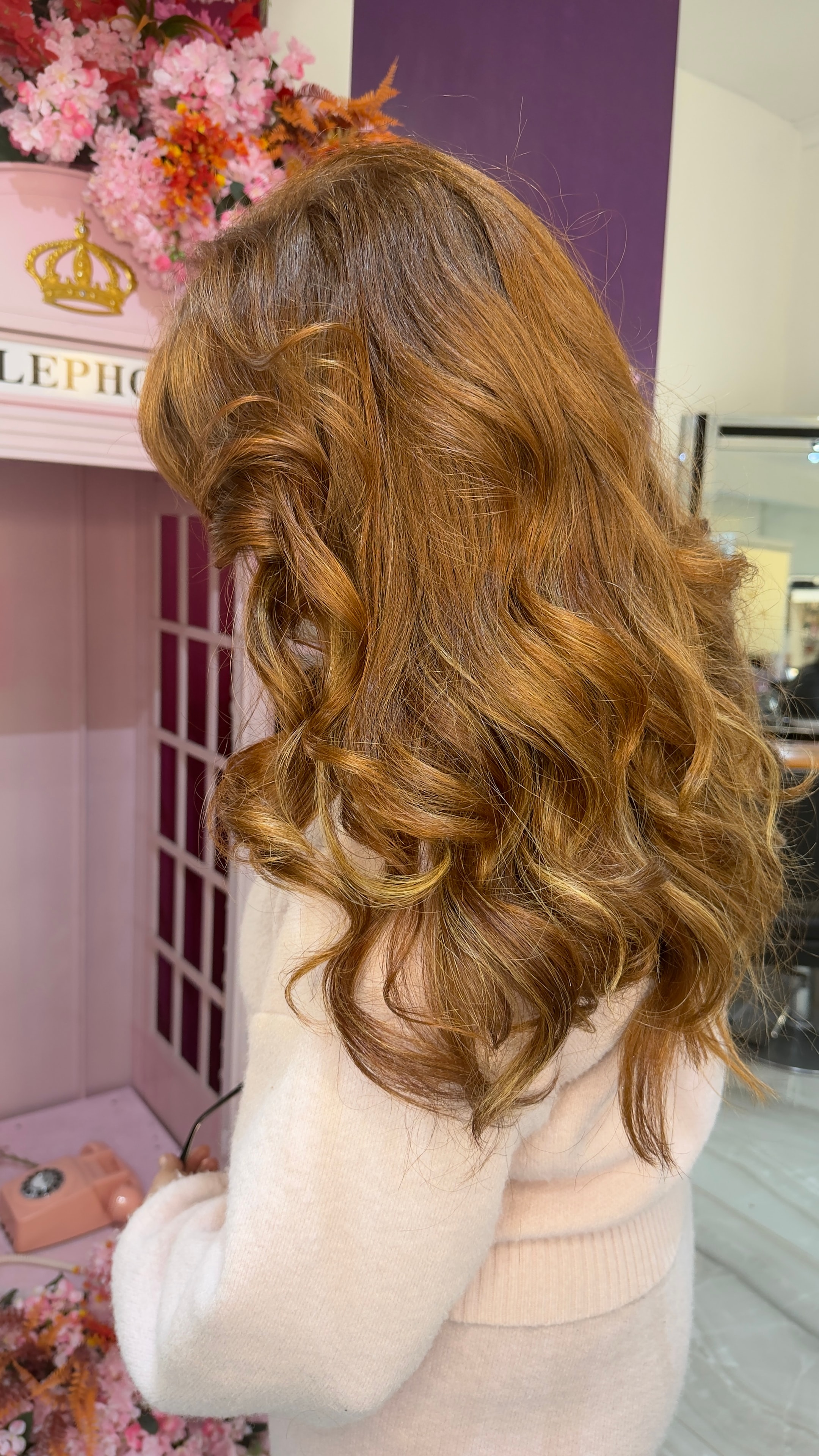 Hair transformation — copper brown waves in the salon
